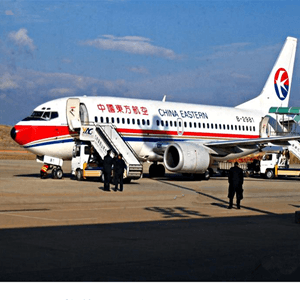 大连周水子机场空运航空快运业稳步发展的原因是什么？